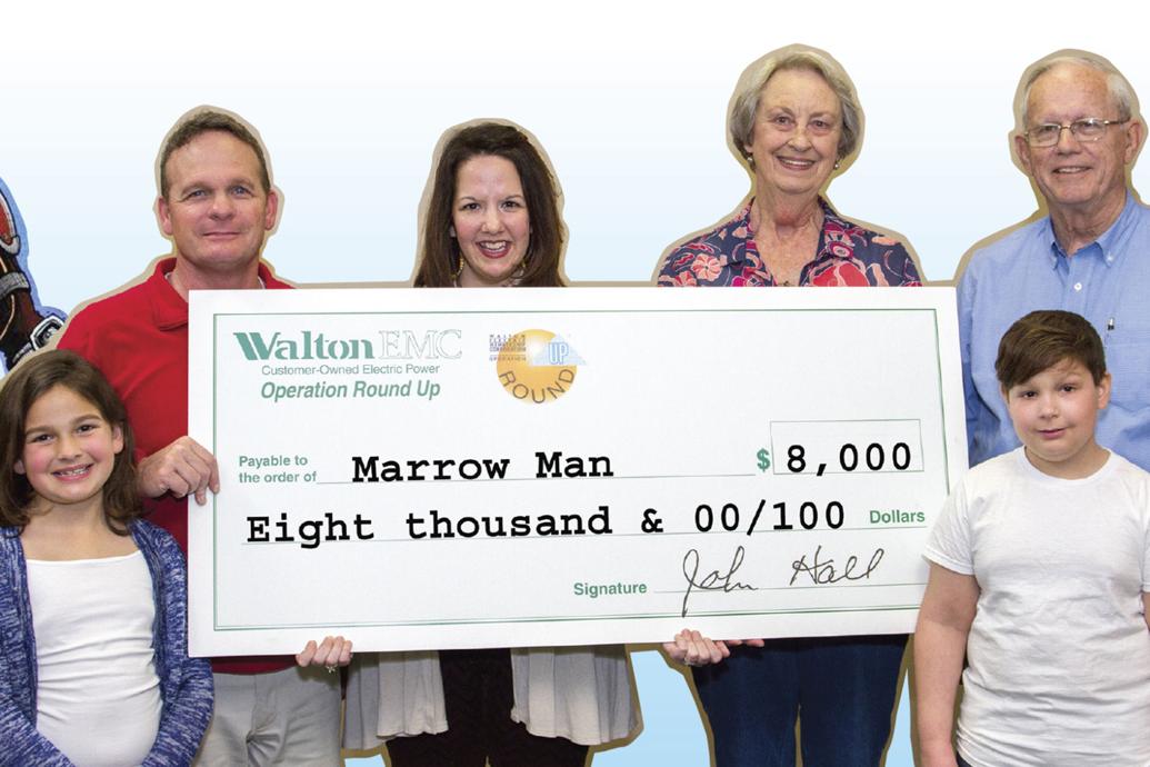 walton-emc-gives-nearly-119-000-through-operation-round-up