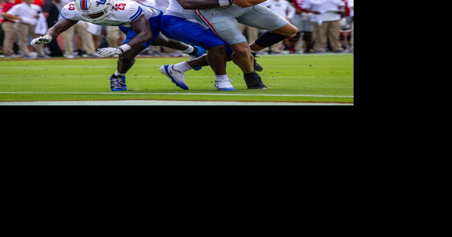 Dawgs spread the wealth in season opener