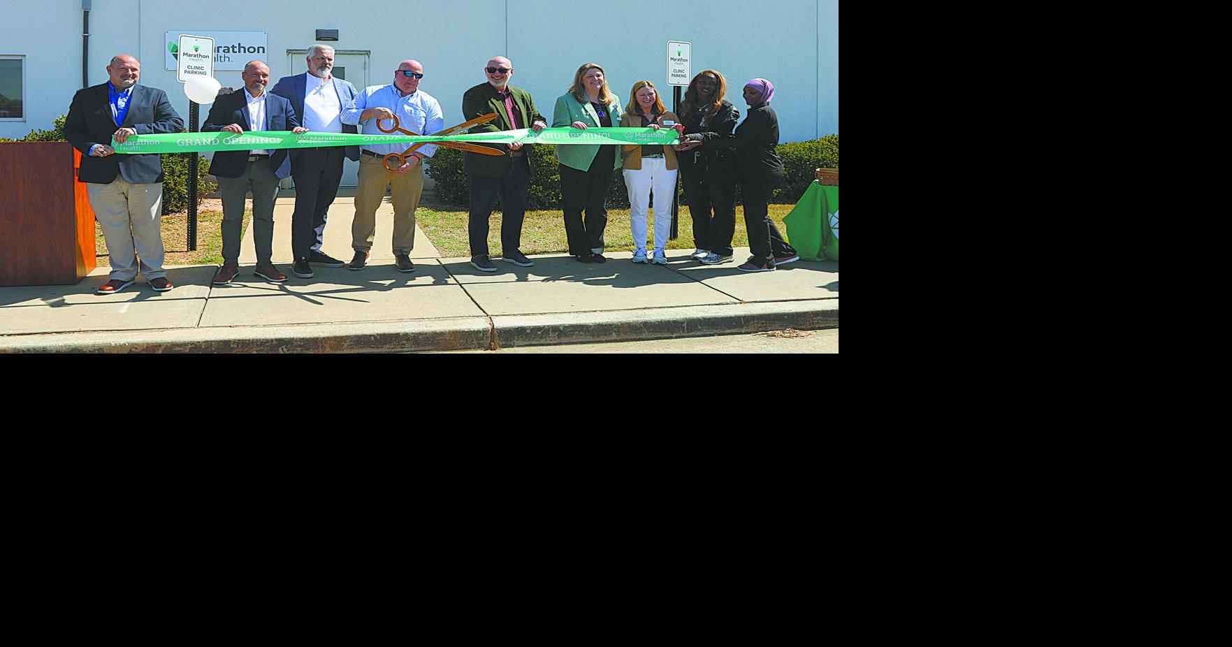 Astemo cuts another ribbon
