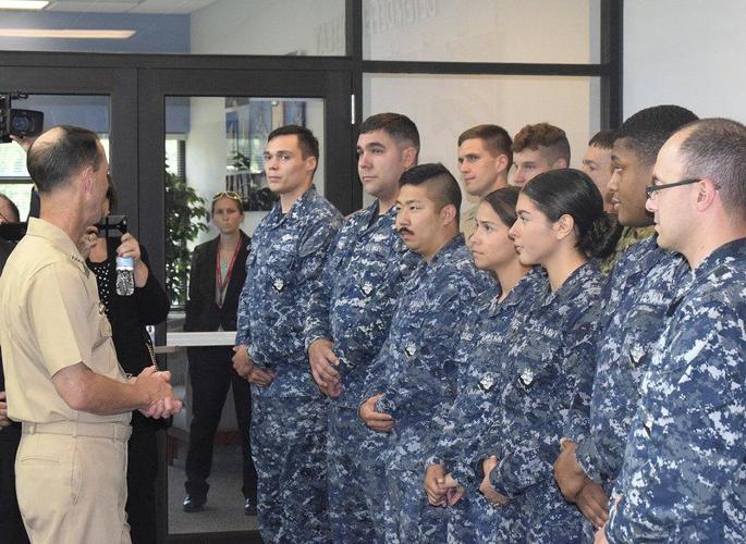 TOP NAVY OFFICIAL VISITS