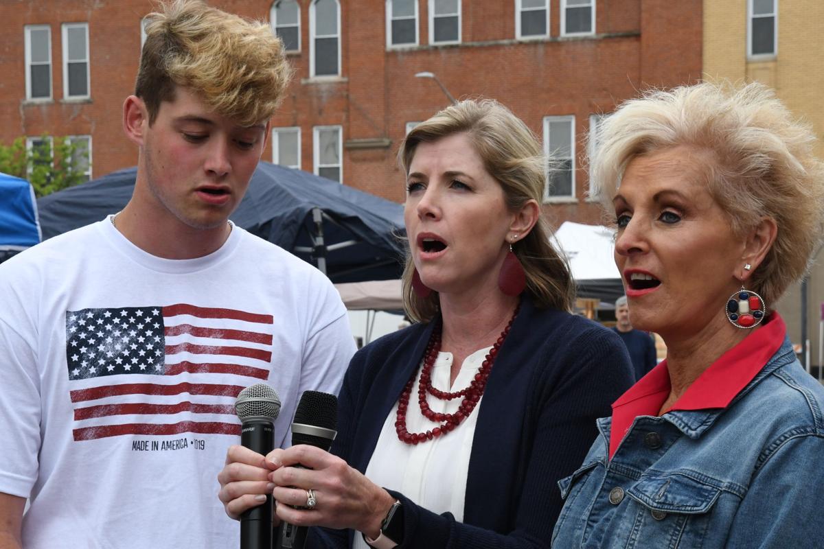 Bryce Browning, Sarah Browning and Vicki Bubalo (grandmother, mother, son) sing the national anthem.JPG