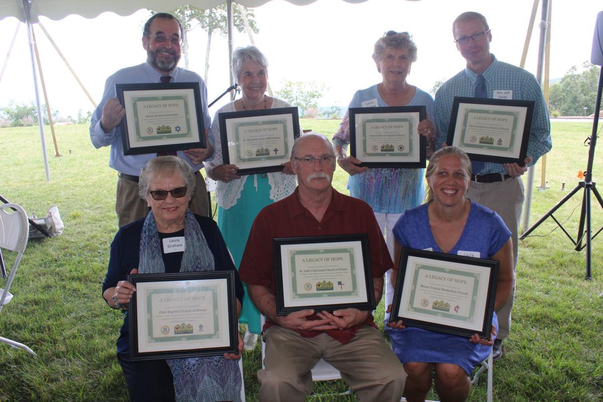 Representatives of the seven Founding Faith Communities receive Legacy of Hope rewards at the 35th anniversary of the Hospitality House.