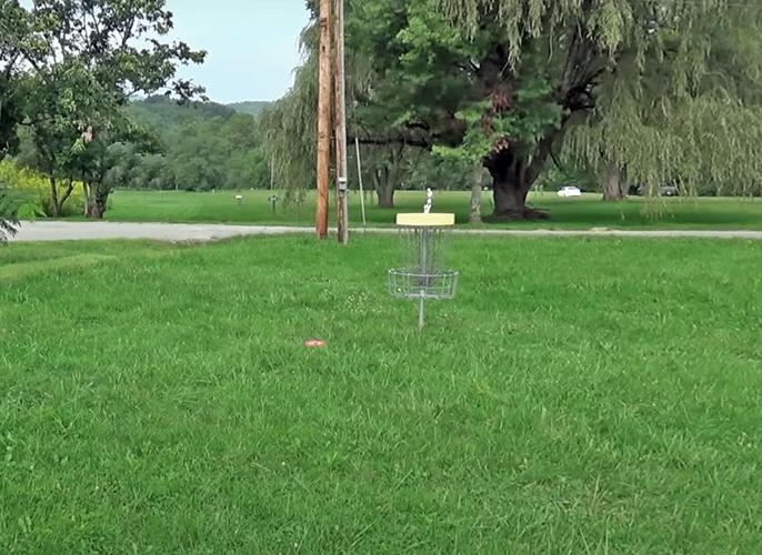 Long throws and challenging holes await playing disc golf in the High