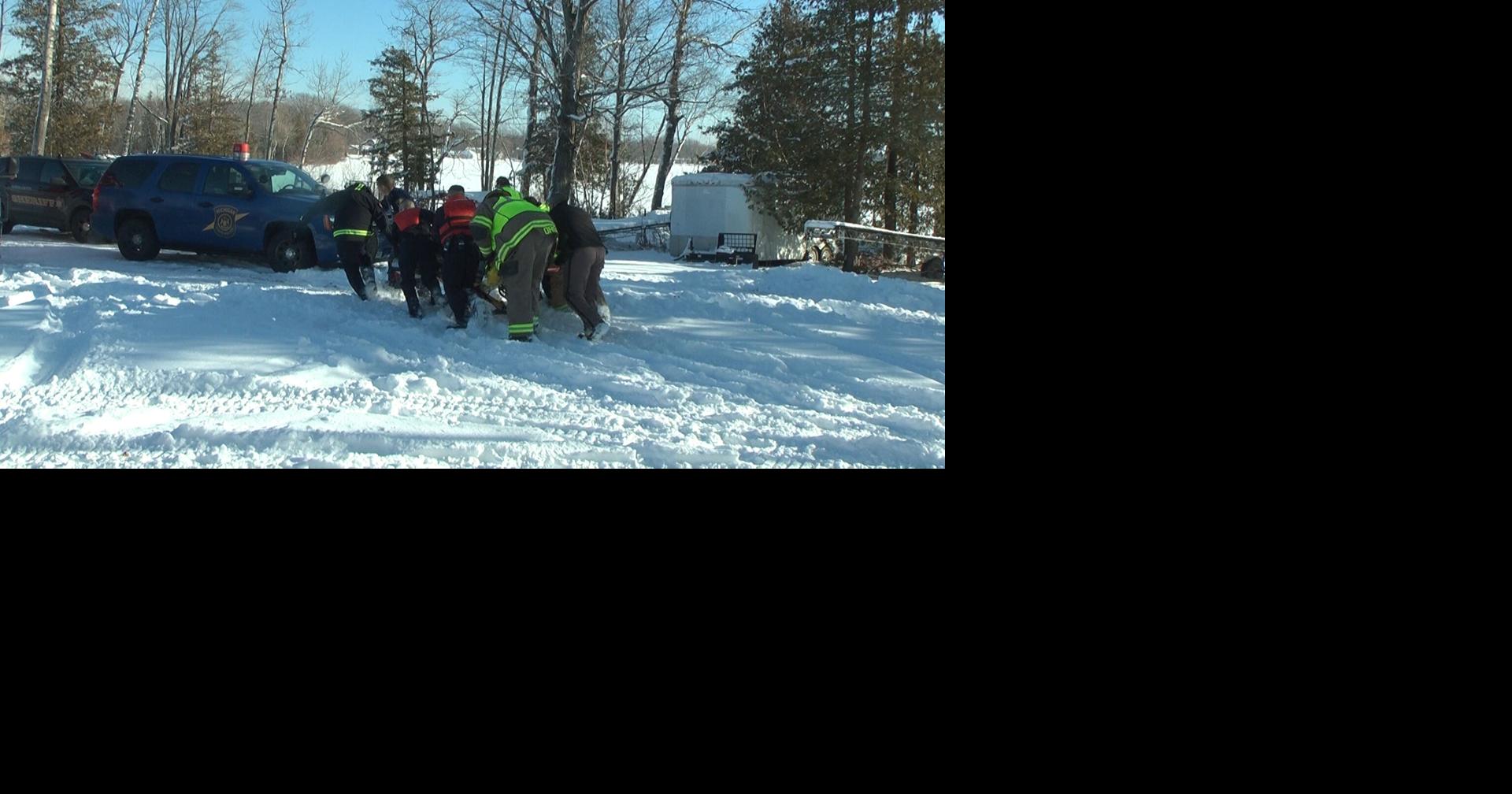 Woman dies, boyfriend survives after snowmobiles fall through ice ...