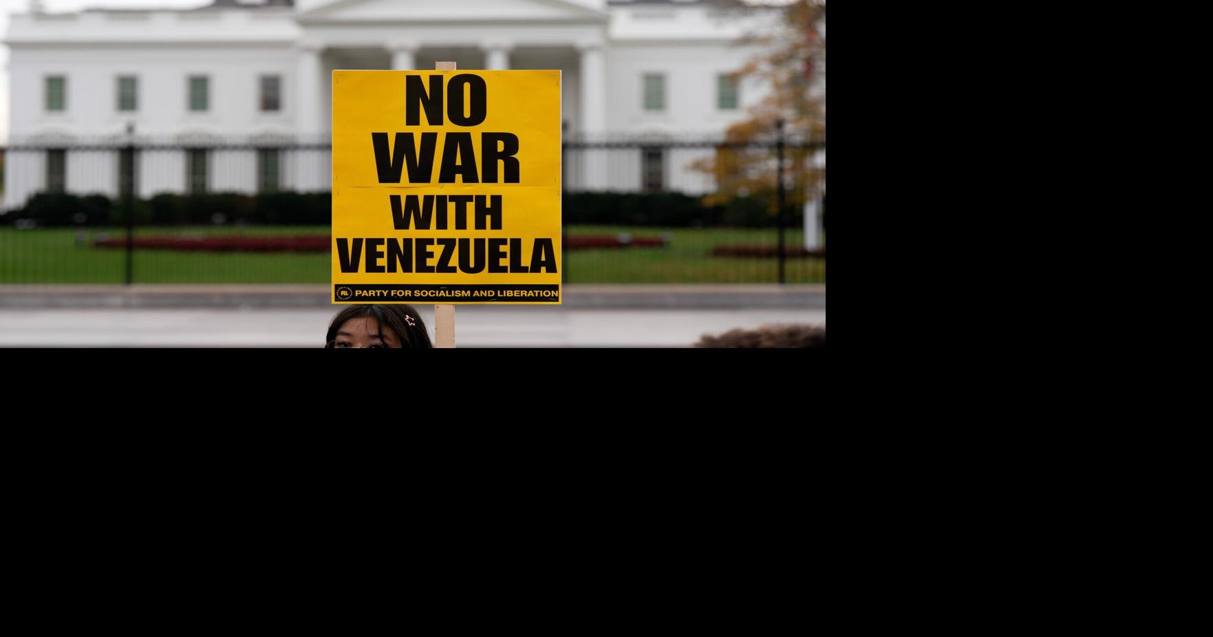 Update: Trump says US may have discussions with Maduro as aircraft carrier arrives in Caribbean