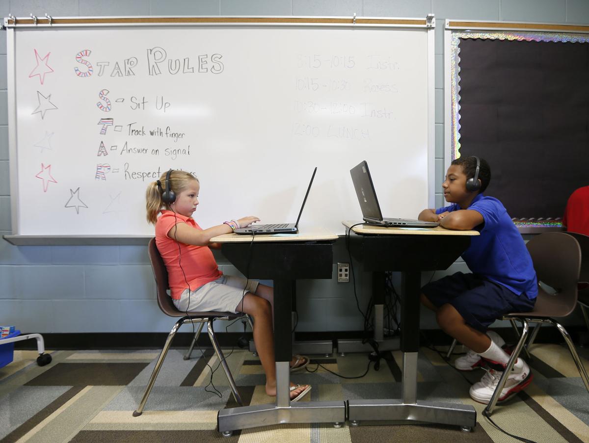 Students work on reading skills at summer school 'camp
