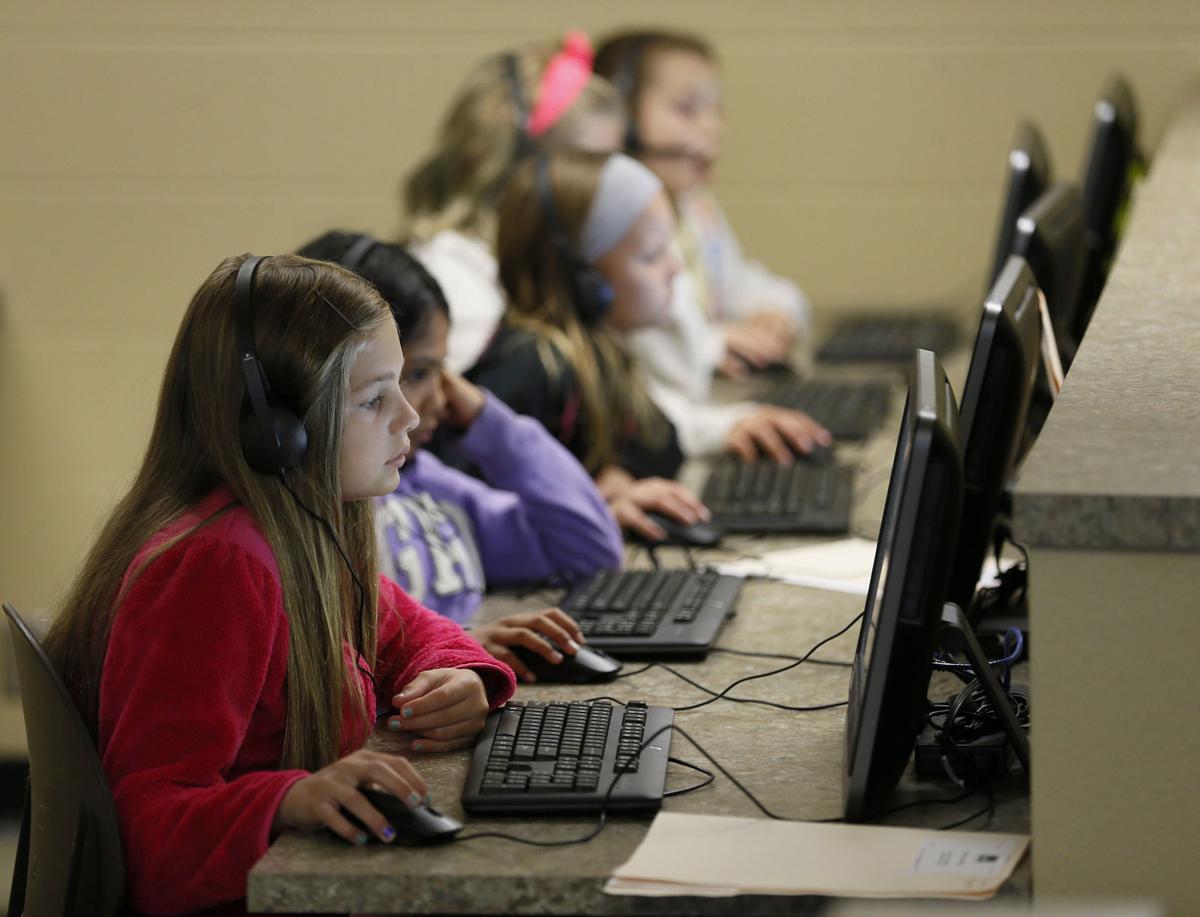 Students work on reading skills at summer school 'camp