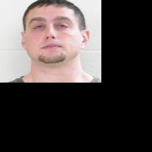 Mason City man charged, woman sought in bank robbery