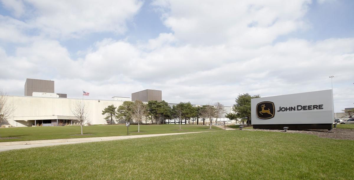 Second person charged in Deere scrap probe