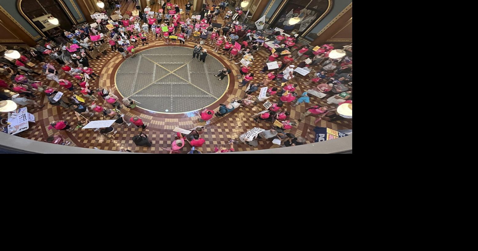 Gov Kim Reynolds signs near-total abortion ban into law