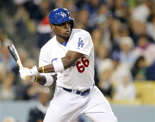 Los Angeles Dodgers third baseman Luis Cruz (47) and Los Angeles