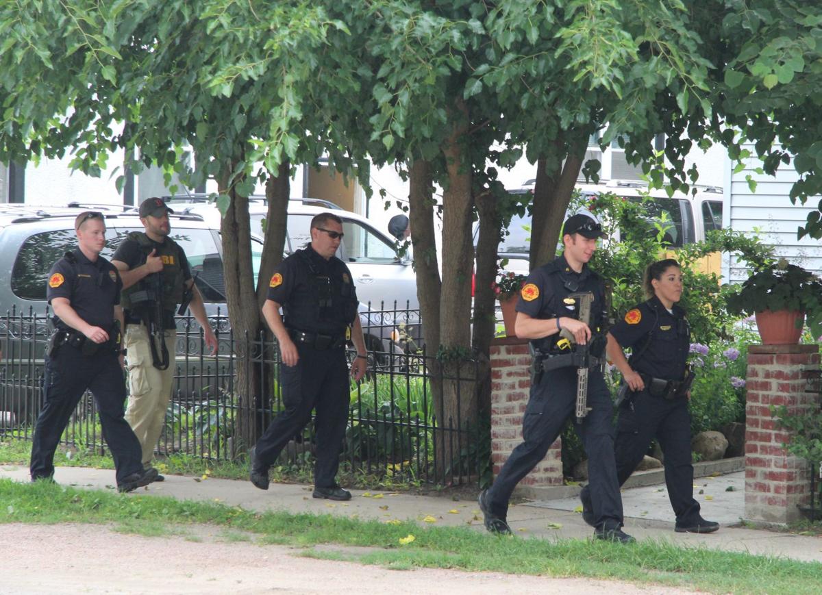 UPDATE Several arrested on gun, drug charges in Waterloo sweep Crime