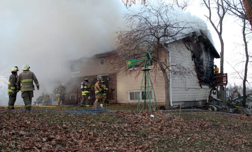 PHOTOS Firefighters battle large blaze at Evansdale home