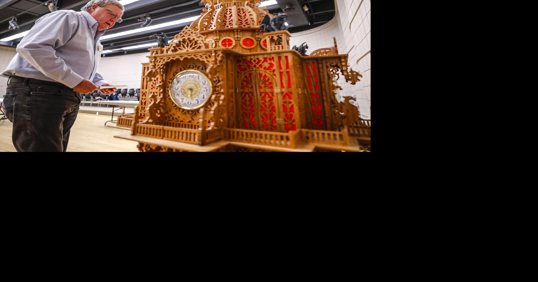 Pieced together: Woodworker spends three years creating elaborate domed clock cathedral