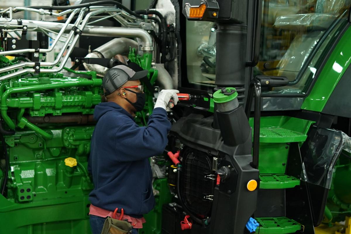 Pandemic means John Deere employees face added layer of security on plant floor Local News