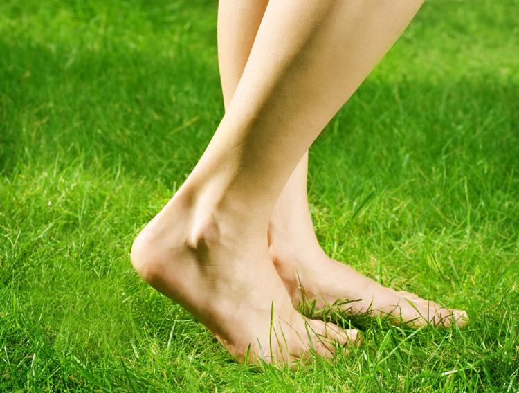 Can walking barefoot on grass improve your health?