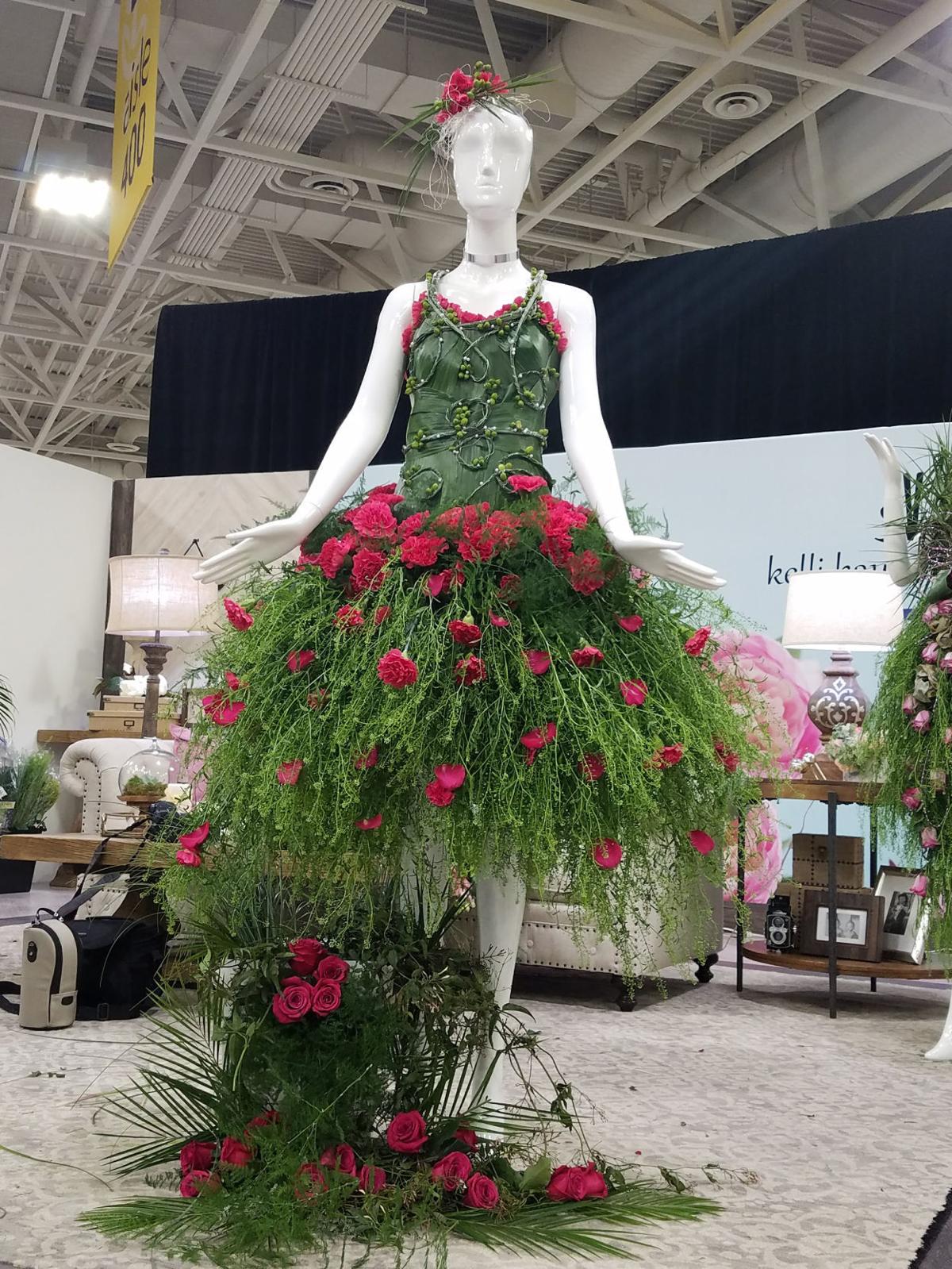 Bloomin' beautiful dress made from flowers wins designer award Local