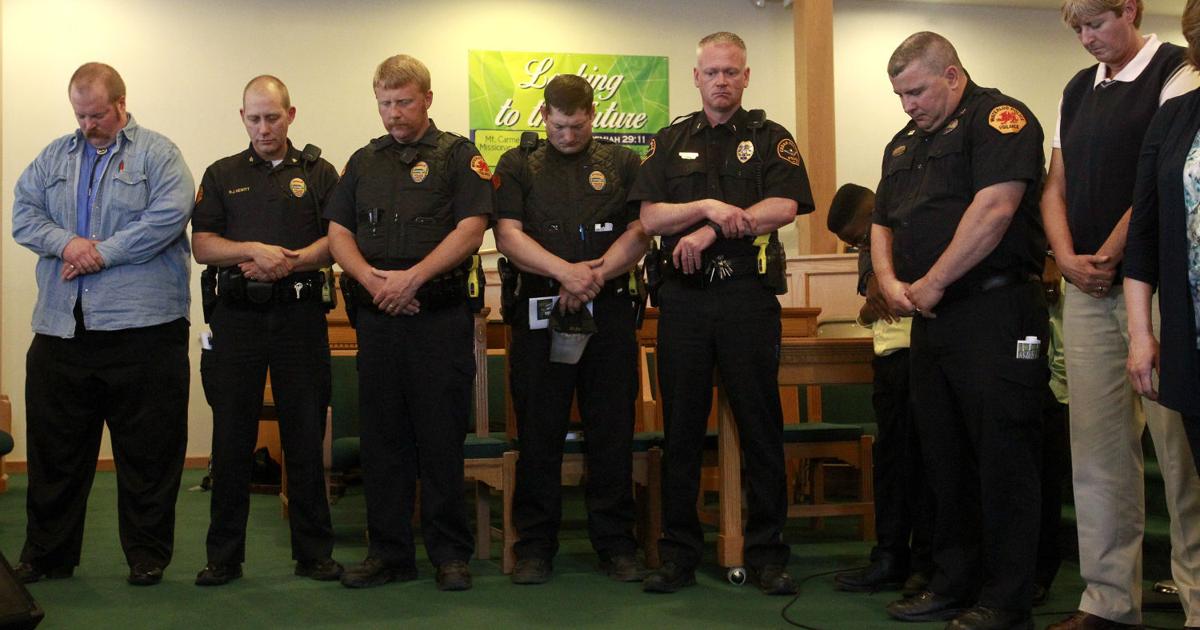 Church Police Python Church, police hope faith builds bridges