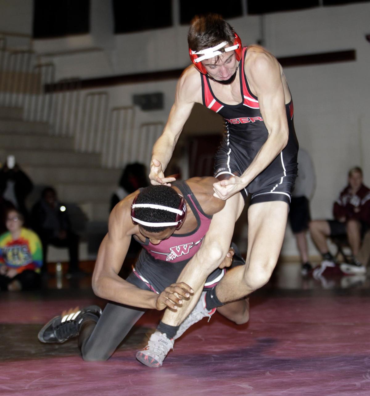 Prep wrestling Cedar Falls strings pins together, defeats West, 4827