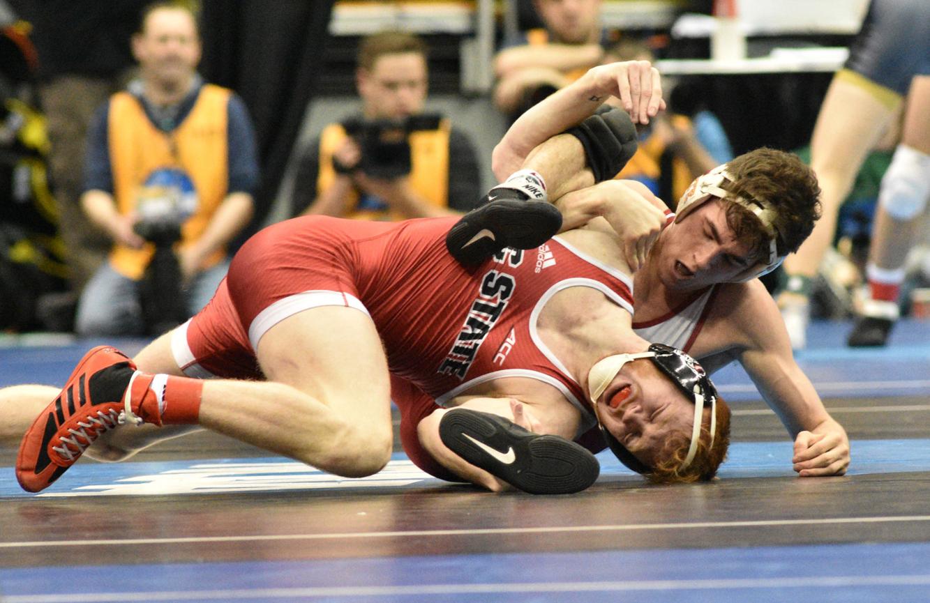 College wrestling Iowa dominates at Midlands Wrestling