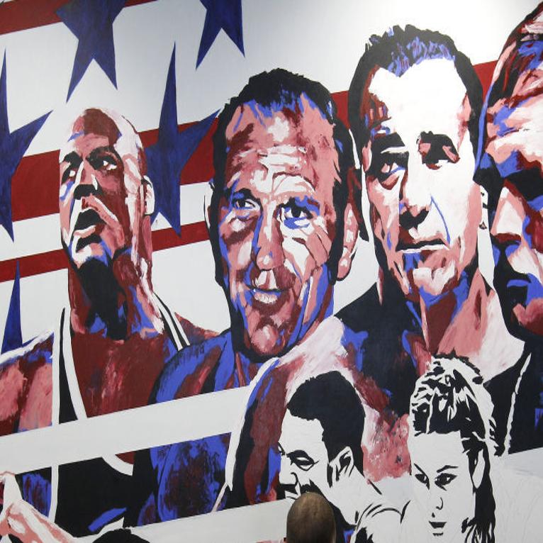 Premiere Wwe Portrait Artist Paints Large Mural At Dan Gable
