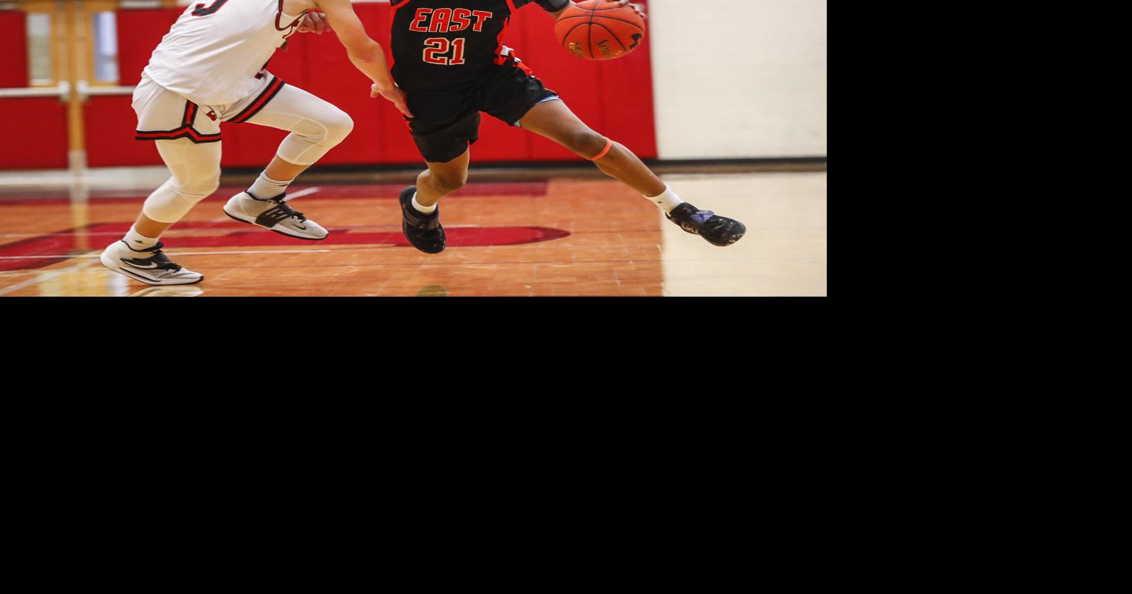 High School Boys’ Basketball: East hangs on for win over Cedar Falls