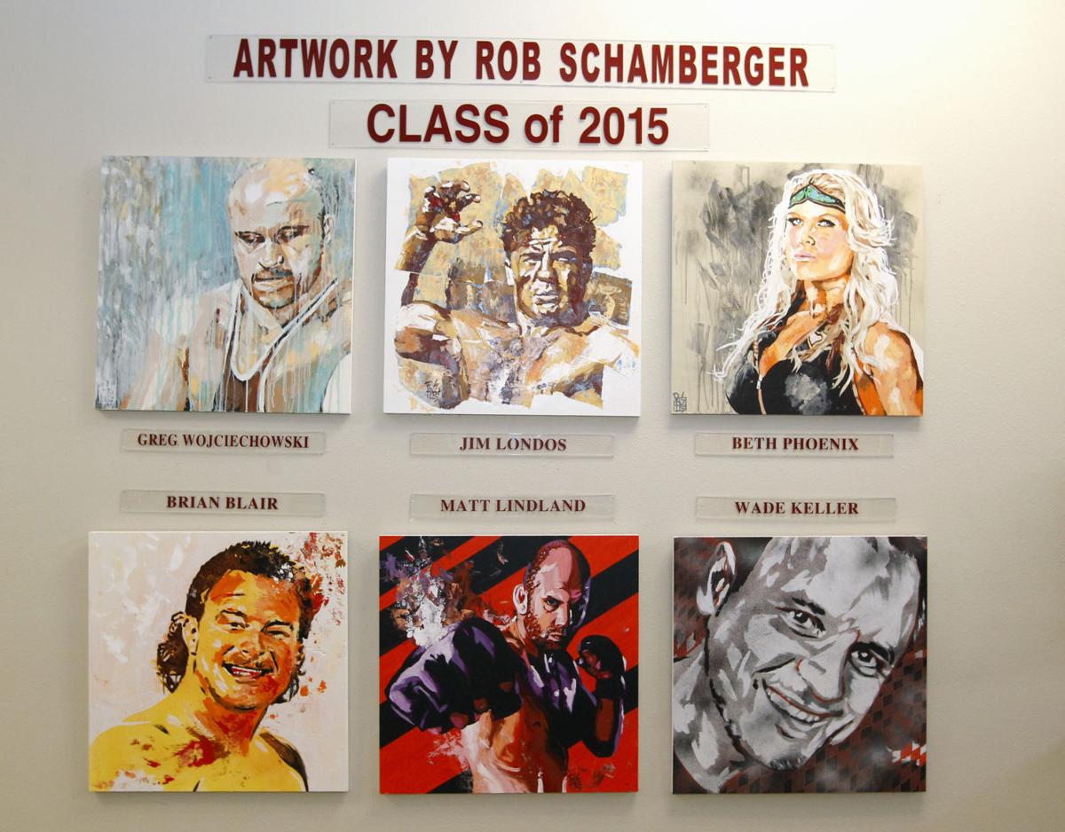 Premiere Wwe Portrait Artist Paints Large Mural At Dan Gable