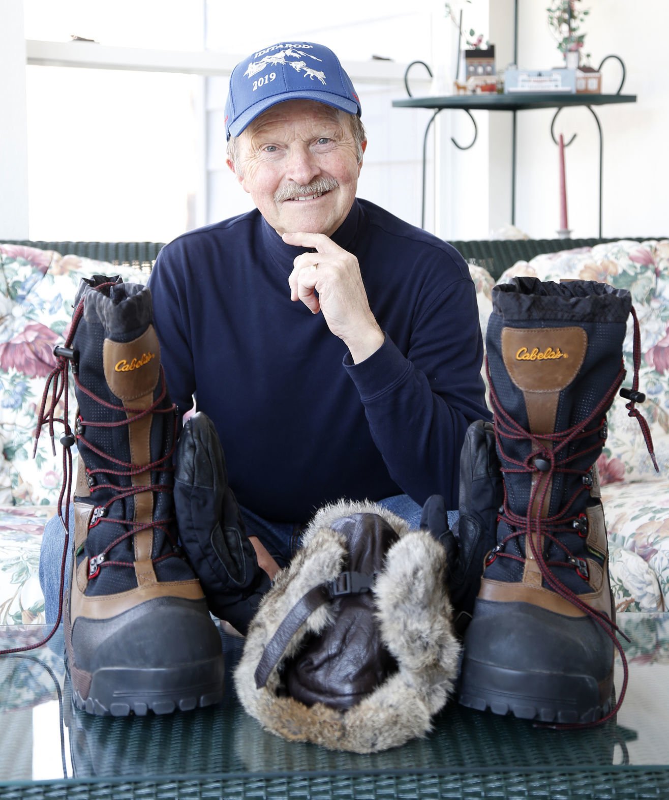 Retired vet Jim Kenyon cares for sled 