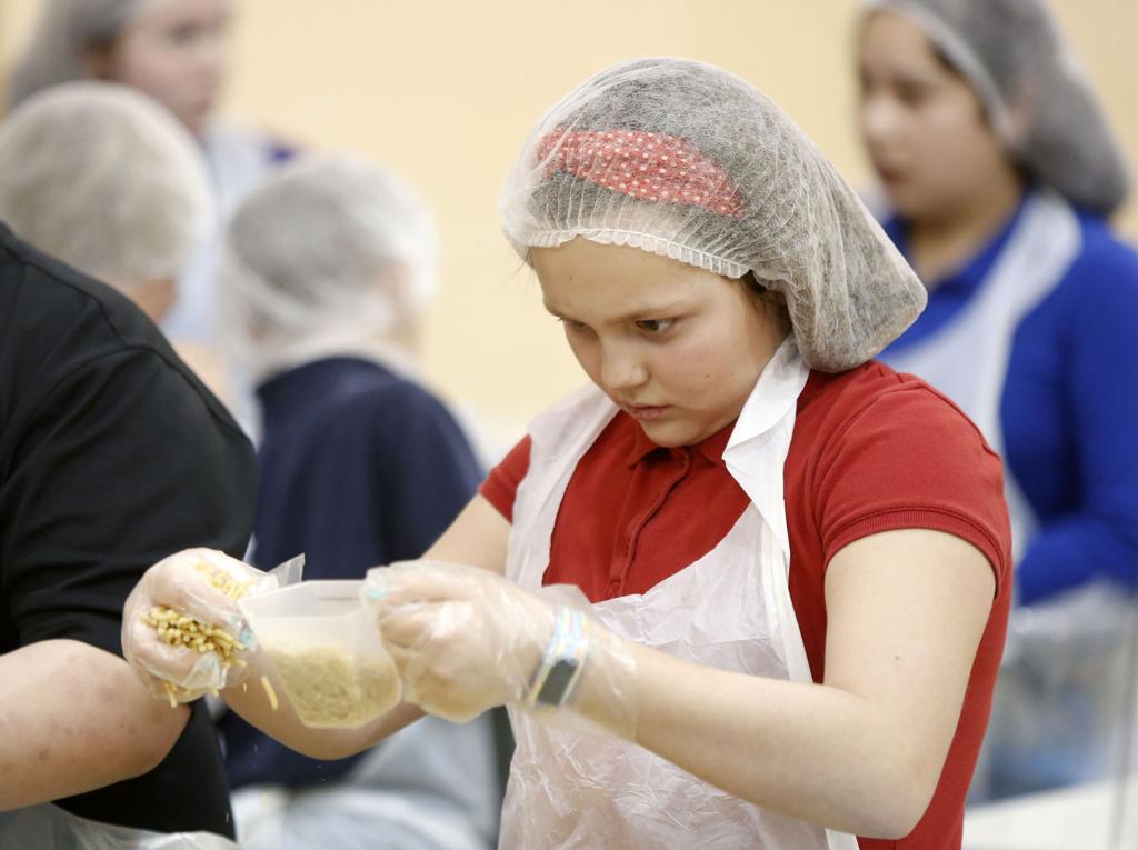 Blessed Sacrament Lenten Food Packing Event Helps Northeast Iowa