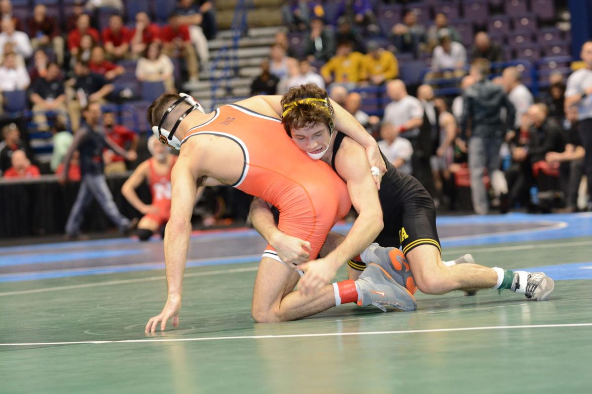 College wrestling Iowa's Clark wins national title Iowa