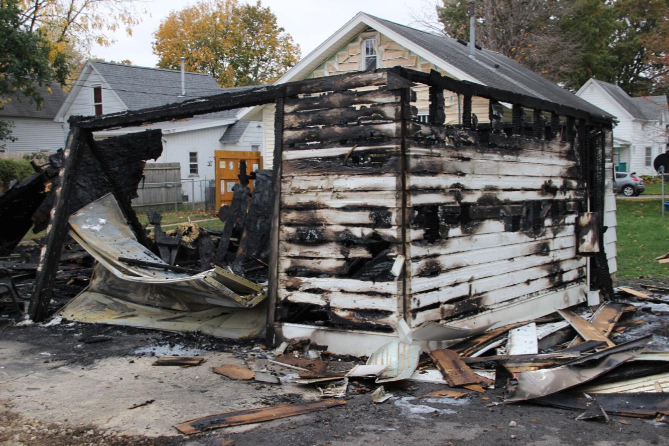 Cedar Falls fire damages garages, pickup truck