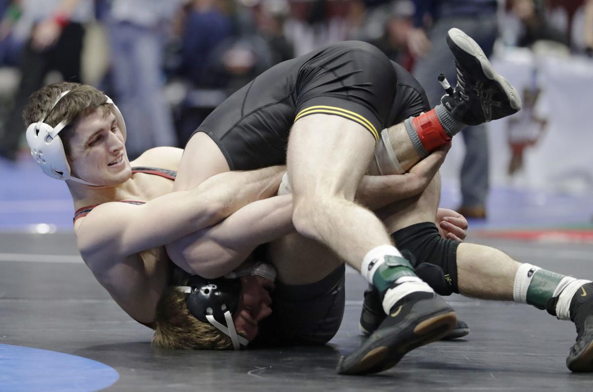 NCAA wrestling Iowa has up and down first day, sits in third place