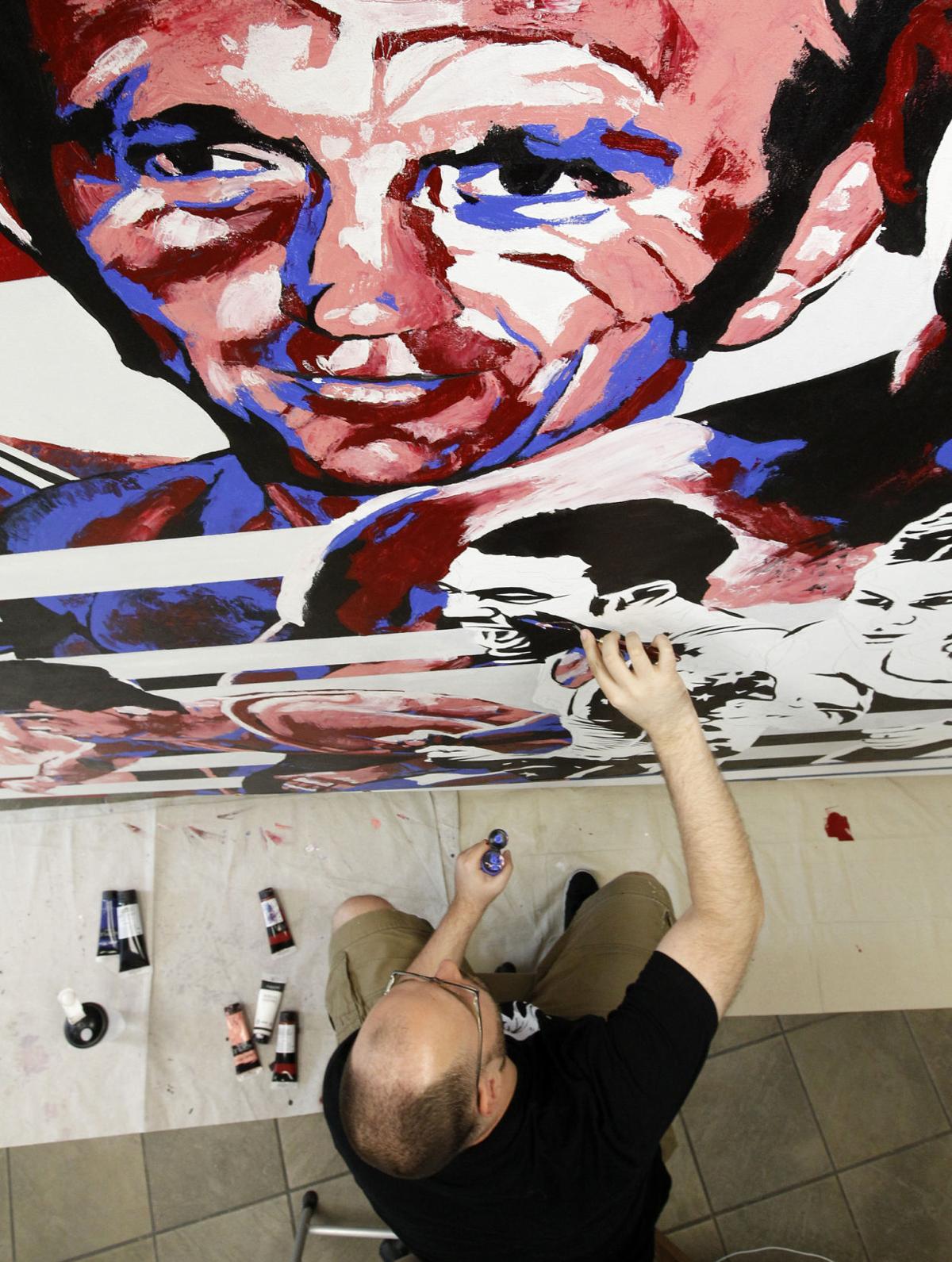 Premiere Wwe Portrait Artist Paints Large Mural At Dan Gable