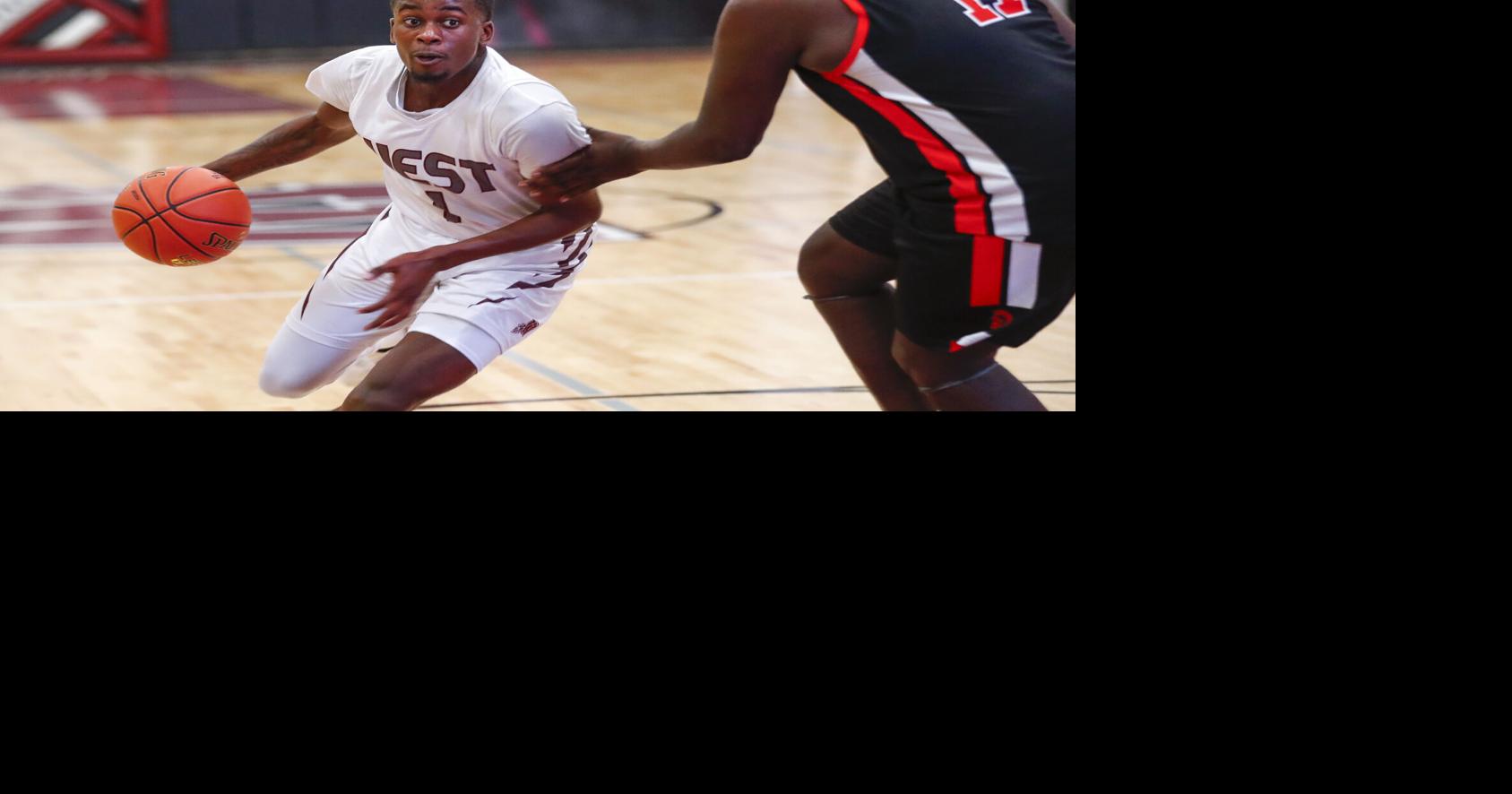 High School Boys' Basketball Waterloo West holds off Charles City