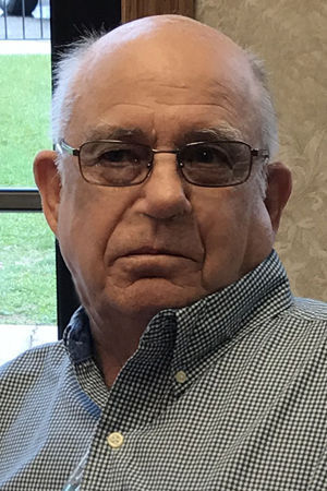 Thomas “Tom” E. Dolan