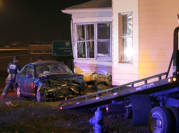 Car crashes into house on University Avenue