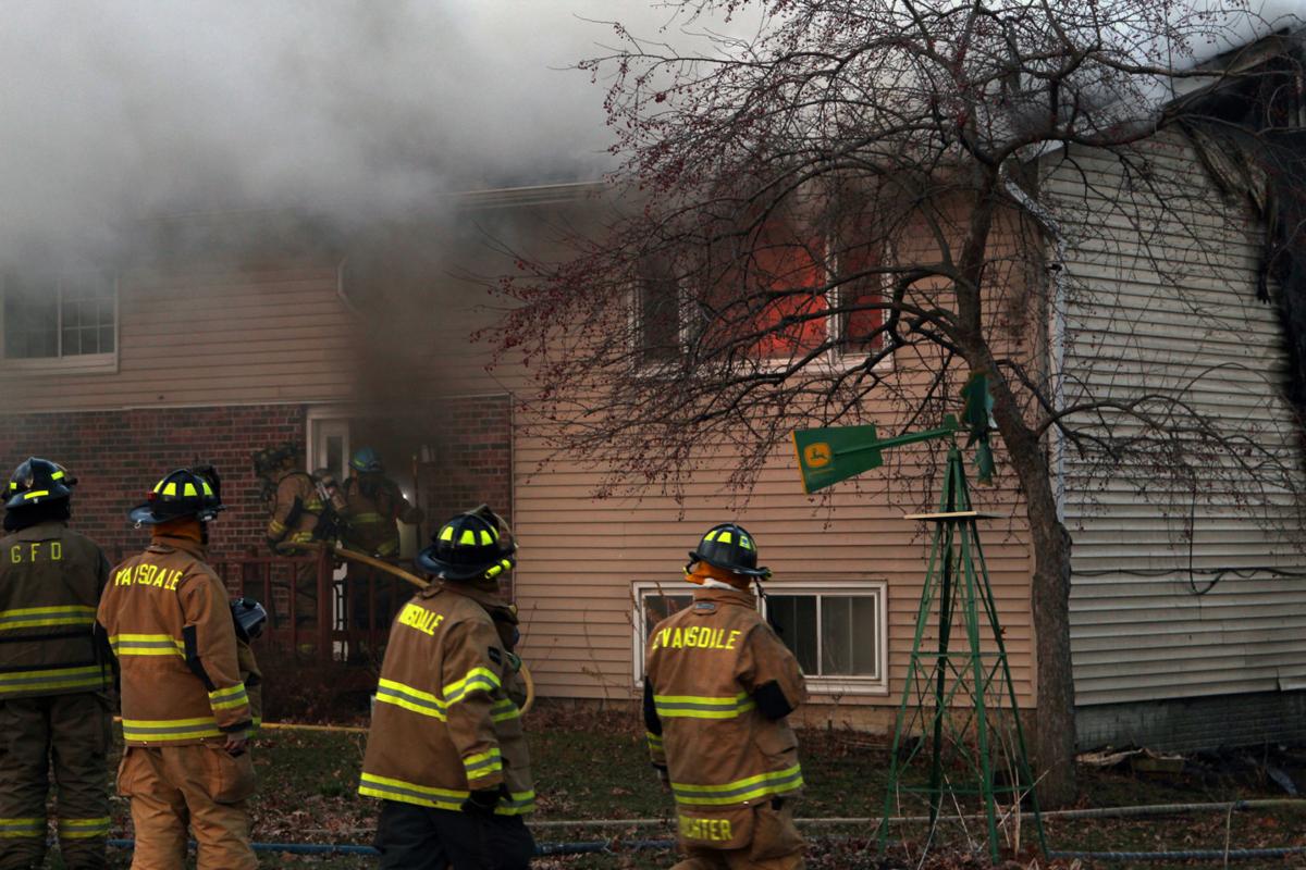 PHOTOS Firefighters battle large blaze at Evansdale home