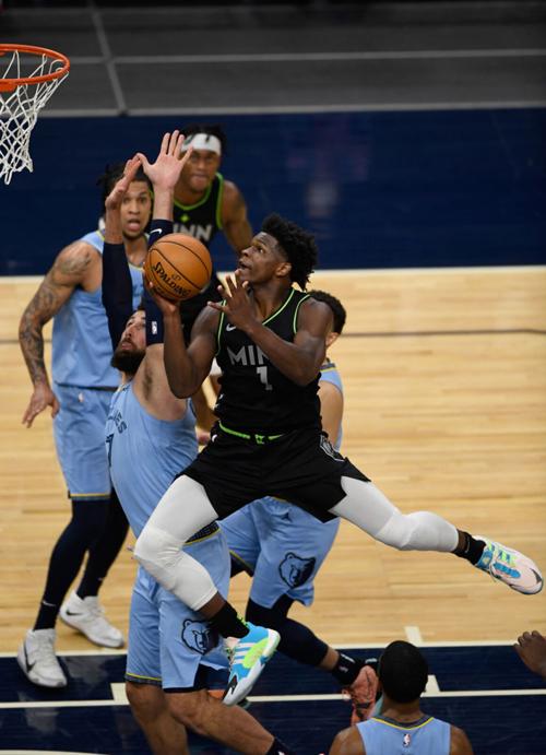 Anthony Edwards #1 of the Minnesota Timberwolves shoots the ball against the Memphis Grizzlies during the fourth quarter of the game at Target Center on May 5, 2021 in Minneapolis, Minnesota.