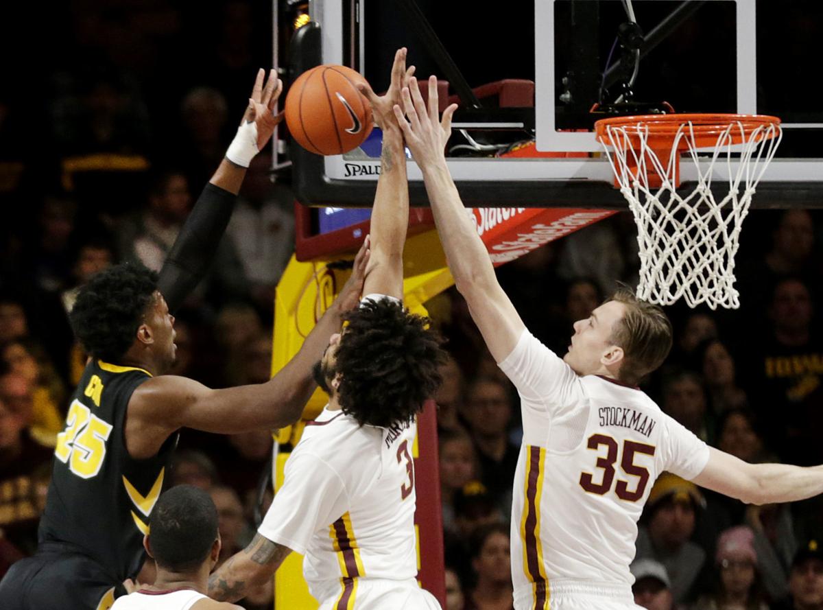 College Men S Basketball Iowa Has No Answers For Minnesota Iowa