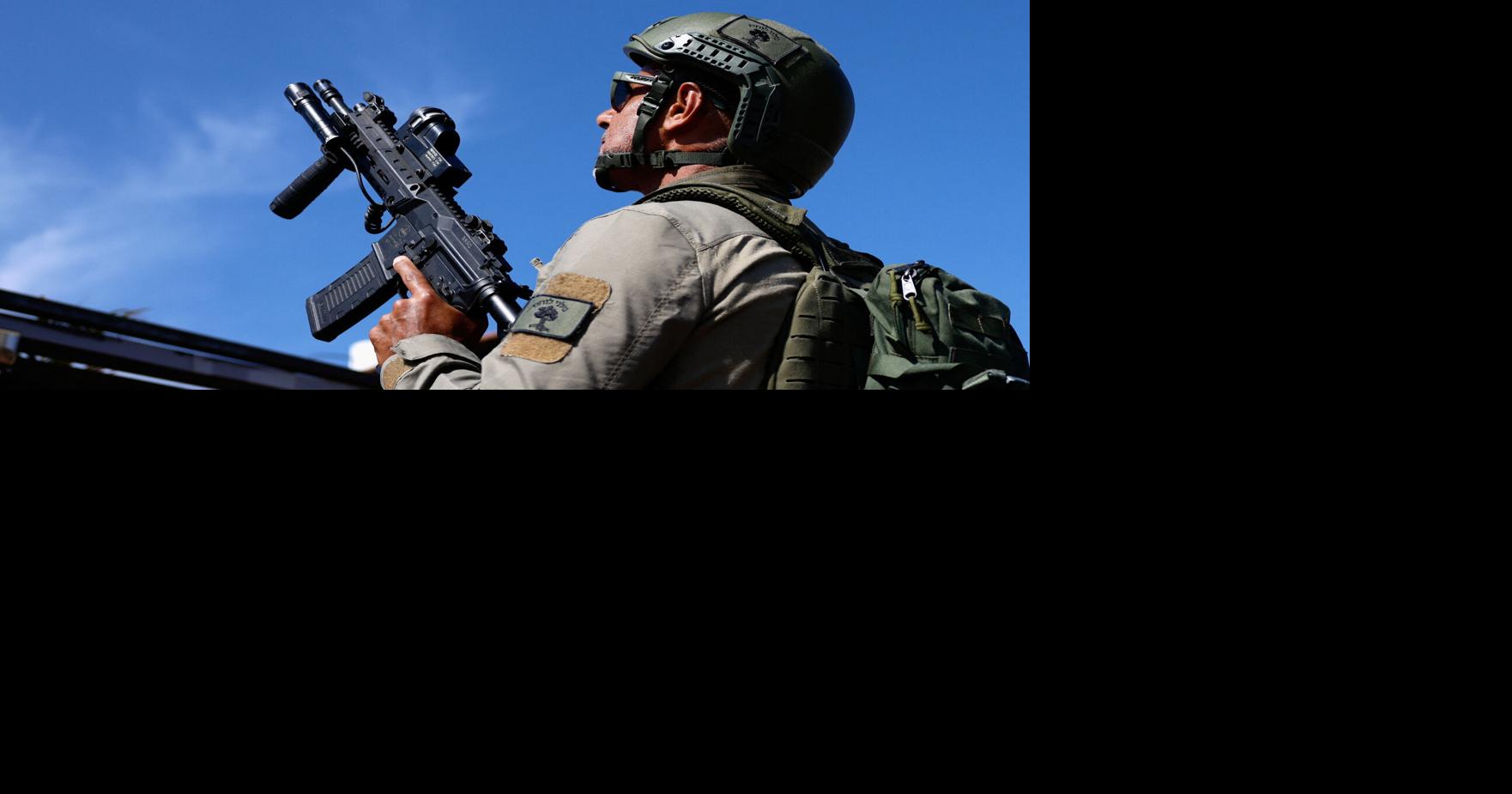 Israeli civilian response team searches for a hostile drone in Metula