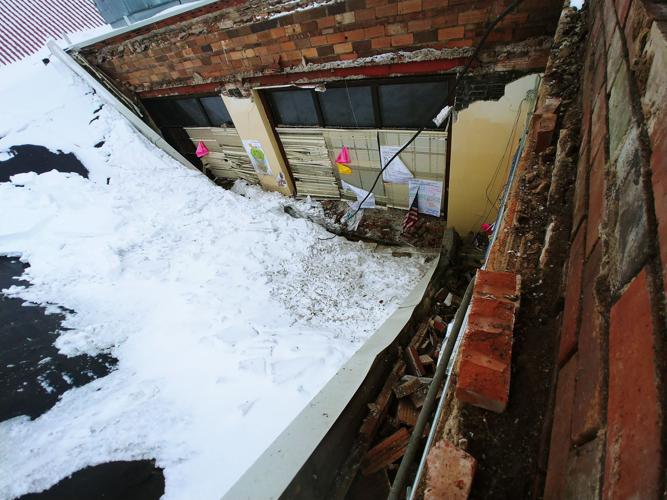 Brand new shopping centre collapses under weight of heavy ROOF