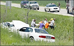 accident fairbank killed near woman two injured wcfcourier crews ambulance victim afternoon response emergency carry waiting monday