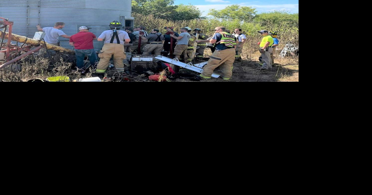 Crews rescue farmer trapped in grain bin overnight
