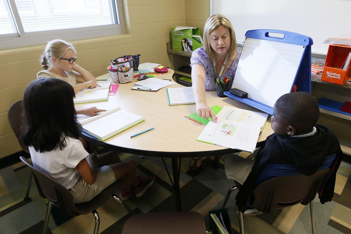 Students work on reading skills at summer school 'camp
