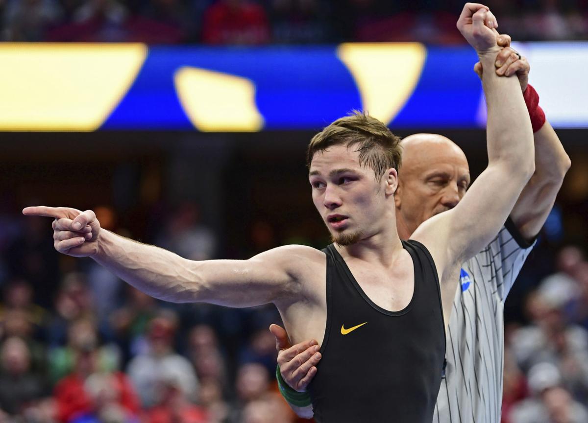 NCAA wrestling Iowa freshman Lee is national champion Iowa