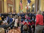 Iowa Gov. Kim Reynolds signs private school bill