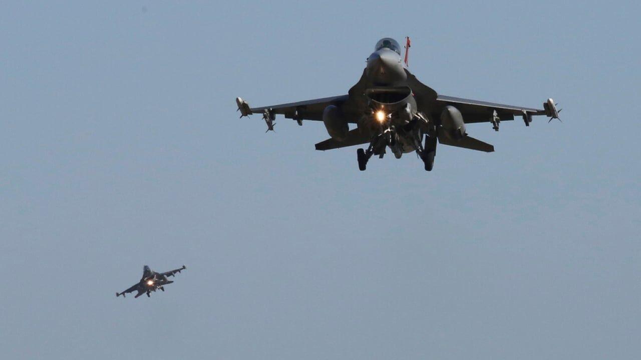 Fighter Pilot Drinks Water While Doing Barrel Rolls in a High Flying Jet