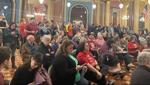 Scores of Iowans pack hearing on tuition aid bill