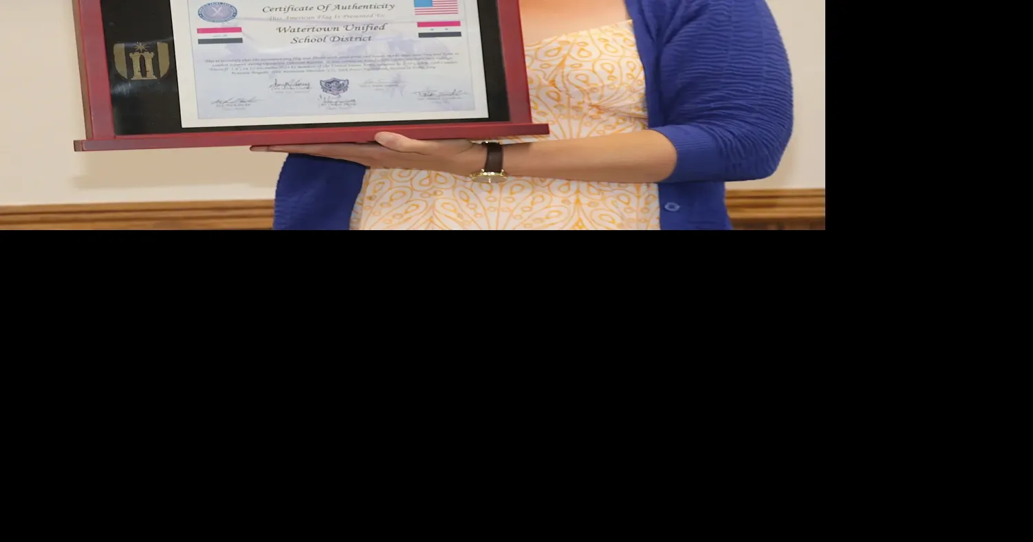 Operation Inherent Resolve flag presented to school district