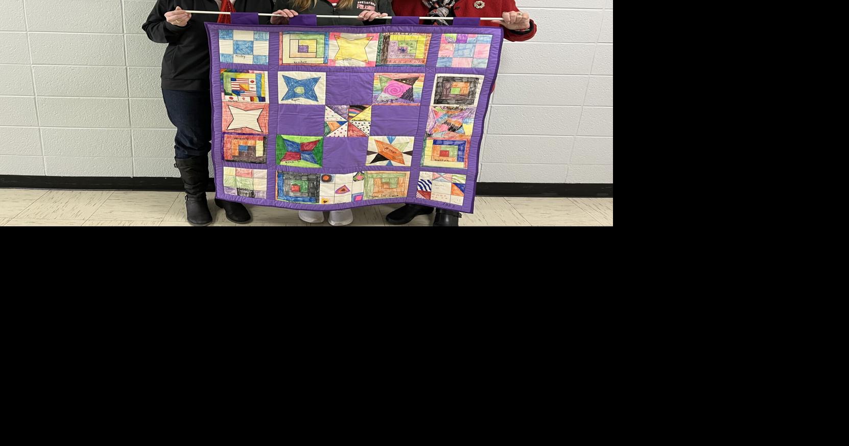 Hustisford Historical Society donates quilt to John Hustis Elementary